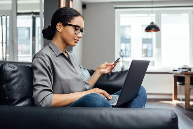 Woman making online payment - Extraco Banks