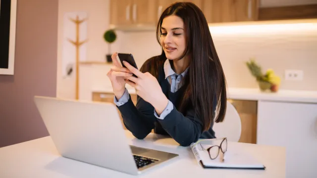 Woman making loan payment