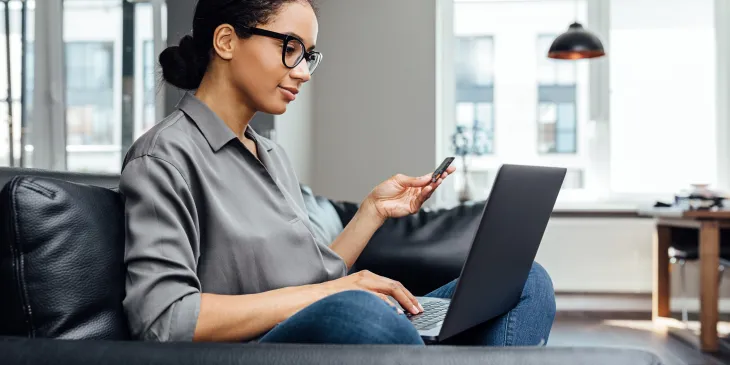 Woman making online payment - Extraco Banks